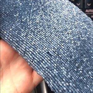 Mound blue beaded clutch